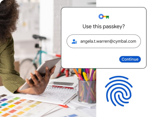A passkey sign-in prompt and fingerprint symbol beside a phone